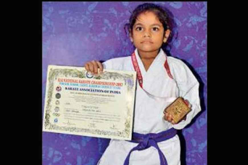 Eight-year-old karate champ fetches gold for country