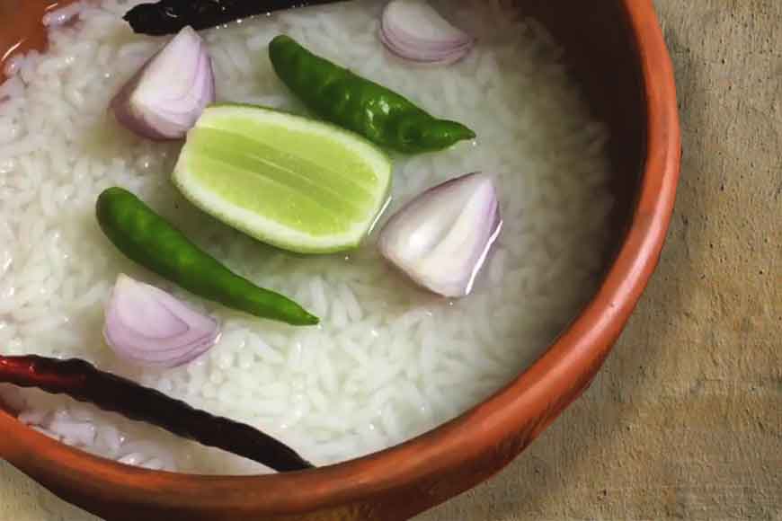 Cook up some Panta Bhaat with a dash of lime and onions this summer