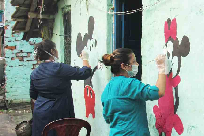 Students of J.D. Birla Institute beautify Tolly slums